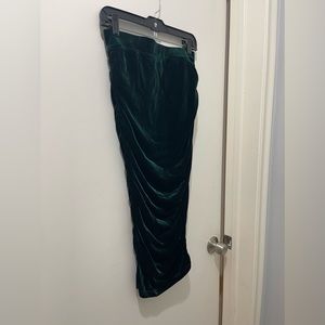 Velvet emerald green skirt. Sides are touched and very flattering.